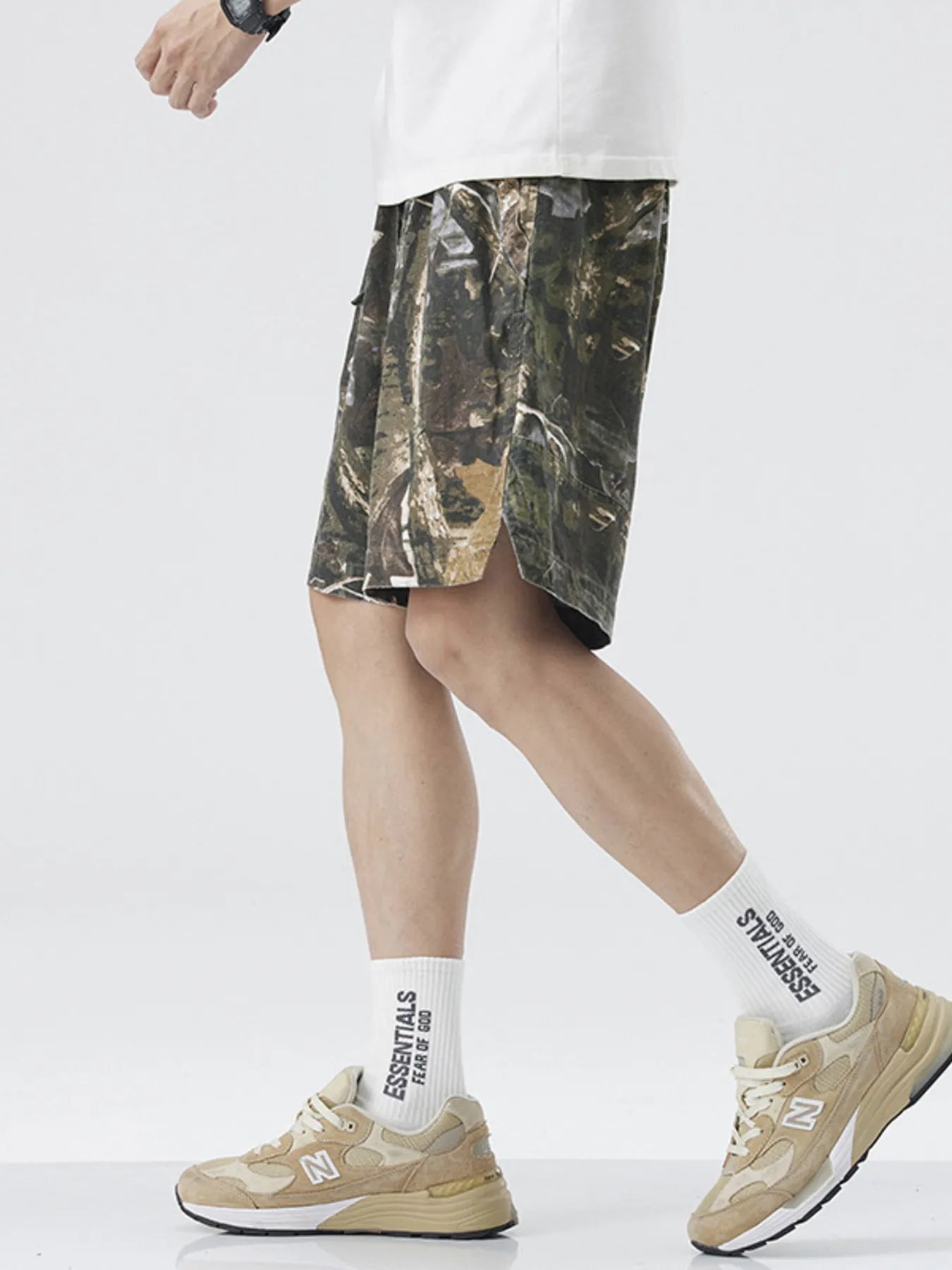 Men's loose fit shorts with a drawstring waist and pockets.