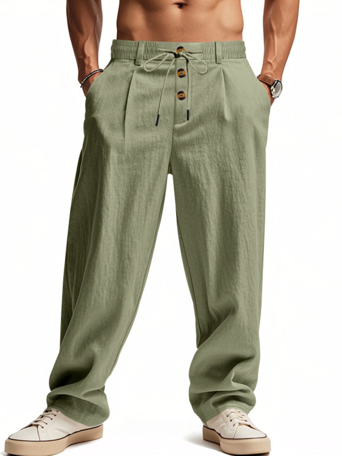 Men's military green loose-fit pants with a drawstring waist and pockets.