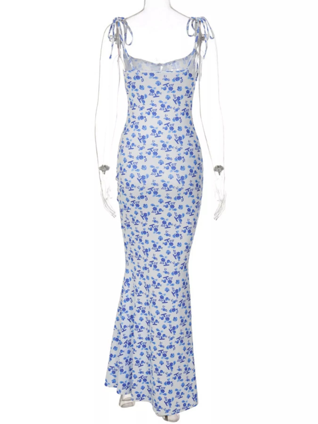 Back view of clear mannequin wearing blue floral print bodycon maxi dress with tie straps