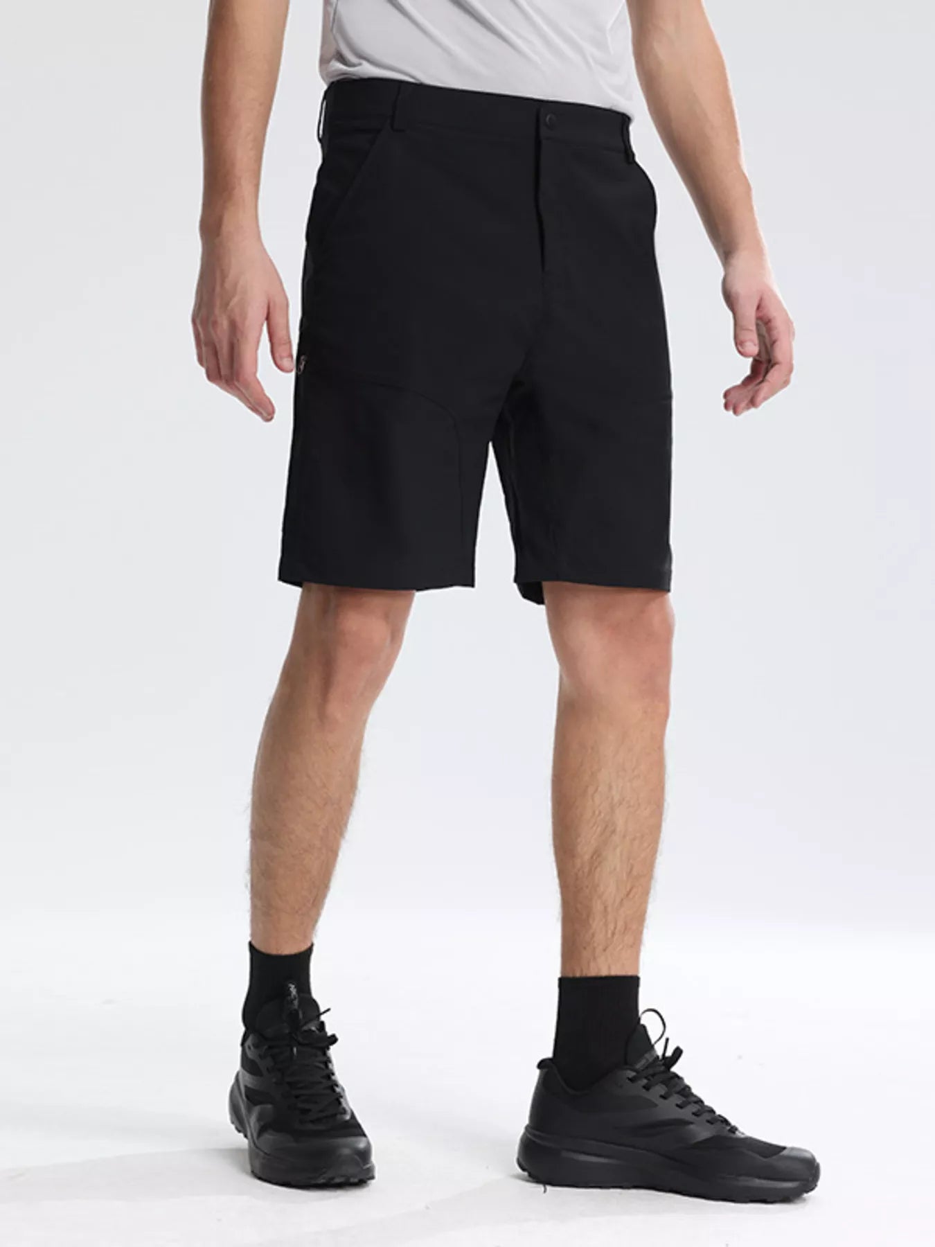 Men's black lightweight casual shorts with pockets.