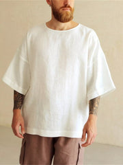 Men's loose-fit T-shirt featuring a round neckline and oversized shape.