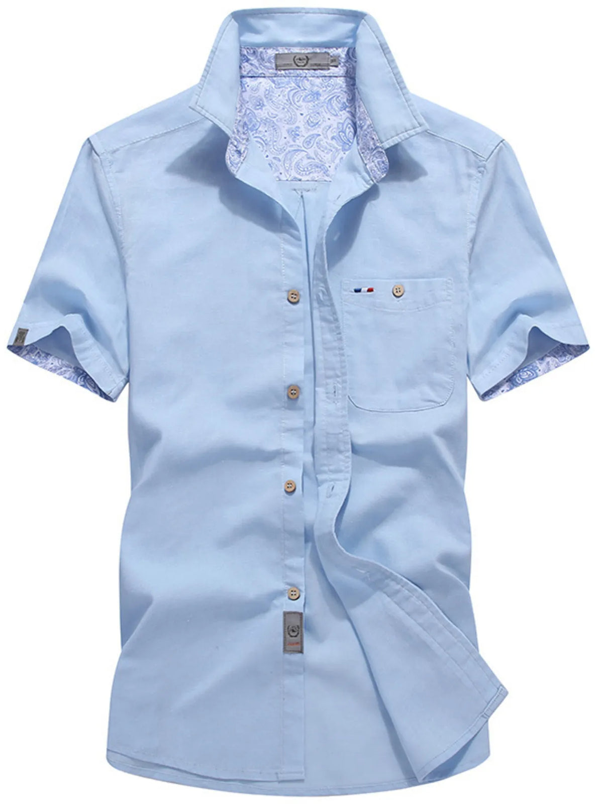 Men's short-sleeve button-up shirt with pocket detailing in a cotton-spandex blend.