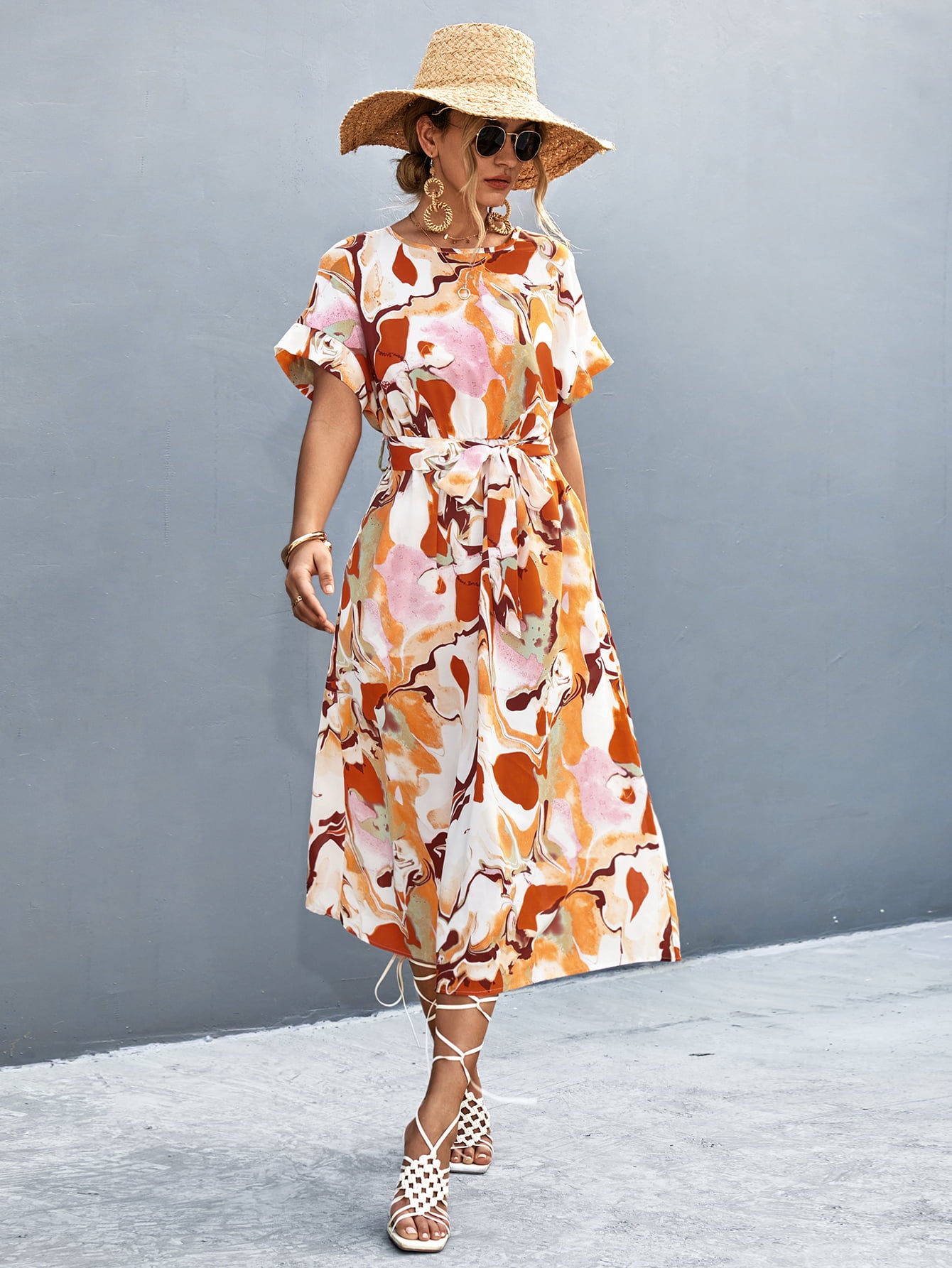 Women's orange-red A-line midi dress with a round neckline, short sleeves and tie waist.