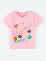 Pink children's short sleeve t-shirt with colorful cartoon flowers, hearts and butterfly print, front flat view