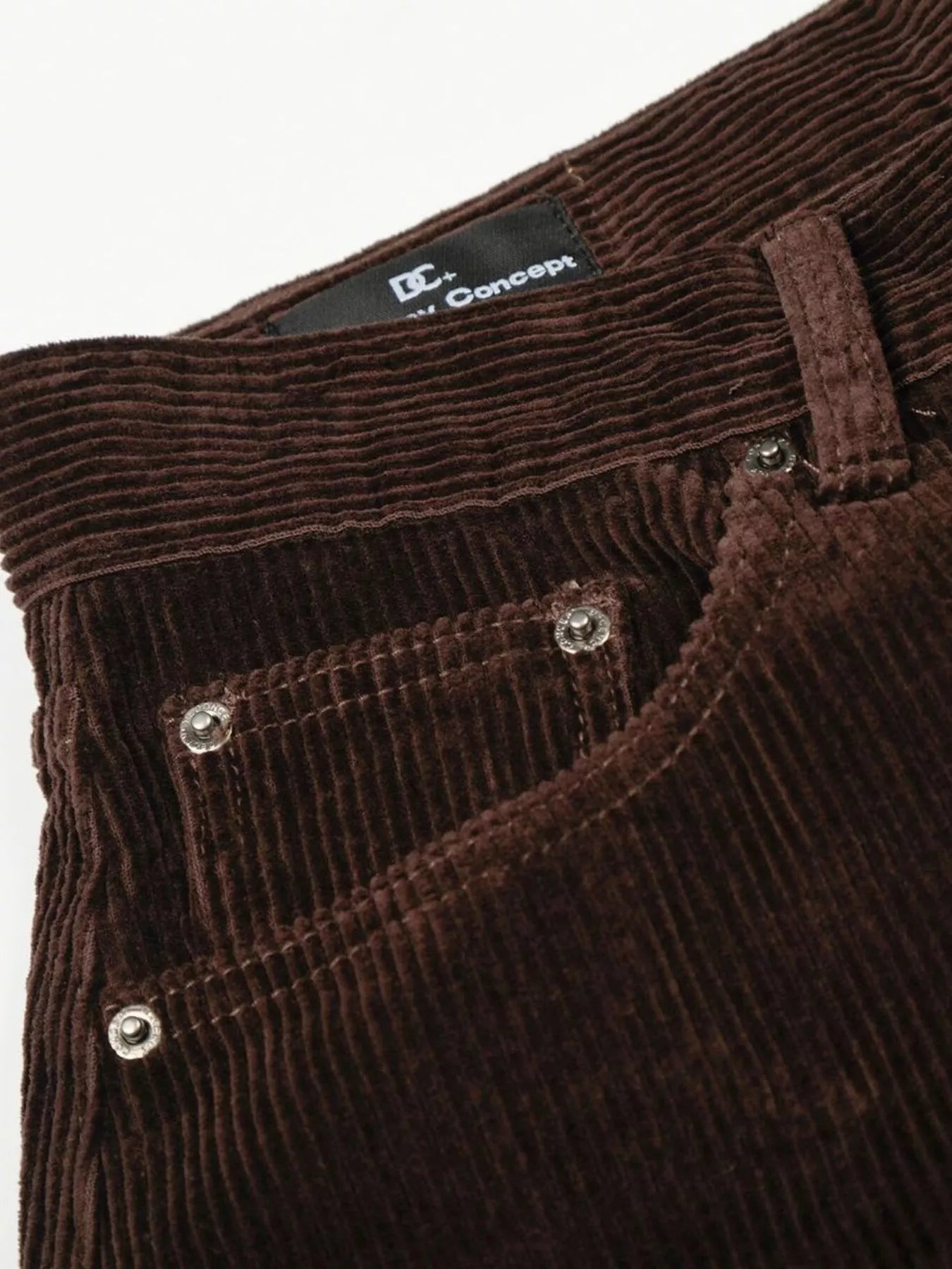 Men's corduroy pants with a wide leg silhouette.