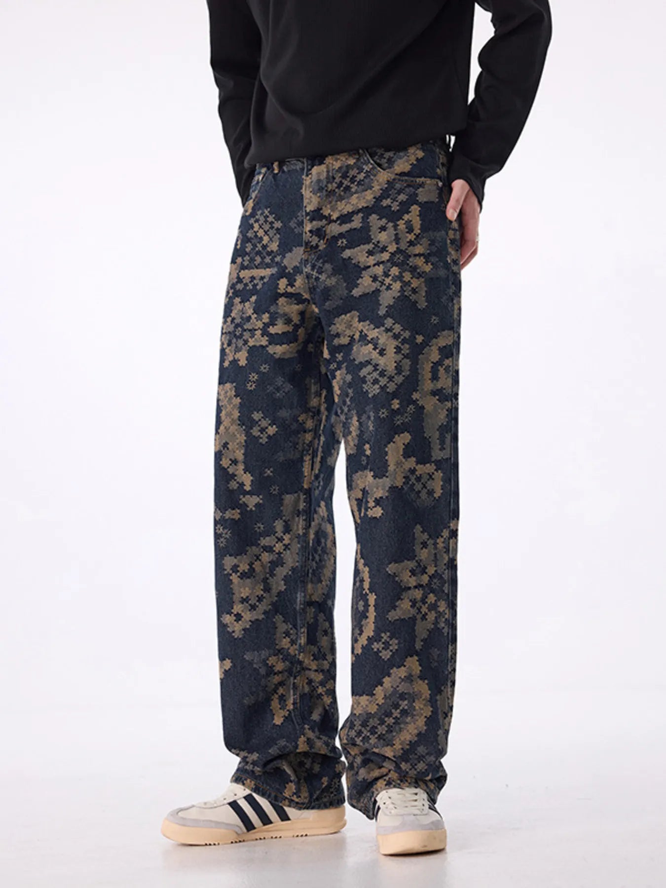 Men's printed wide leg cargo pants with pockets.
