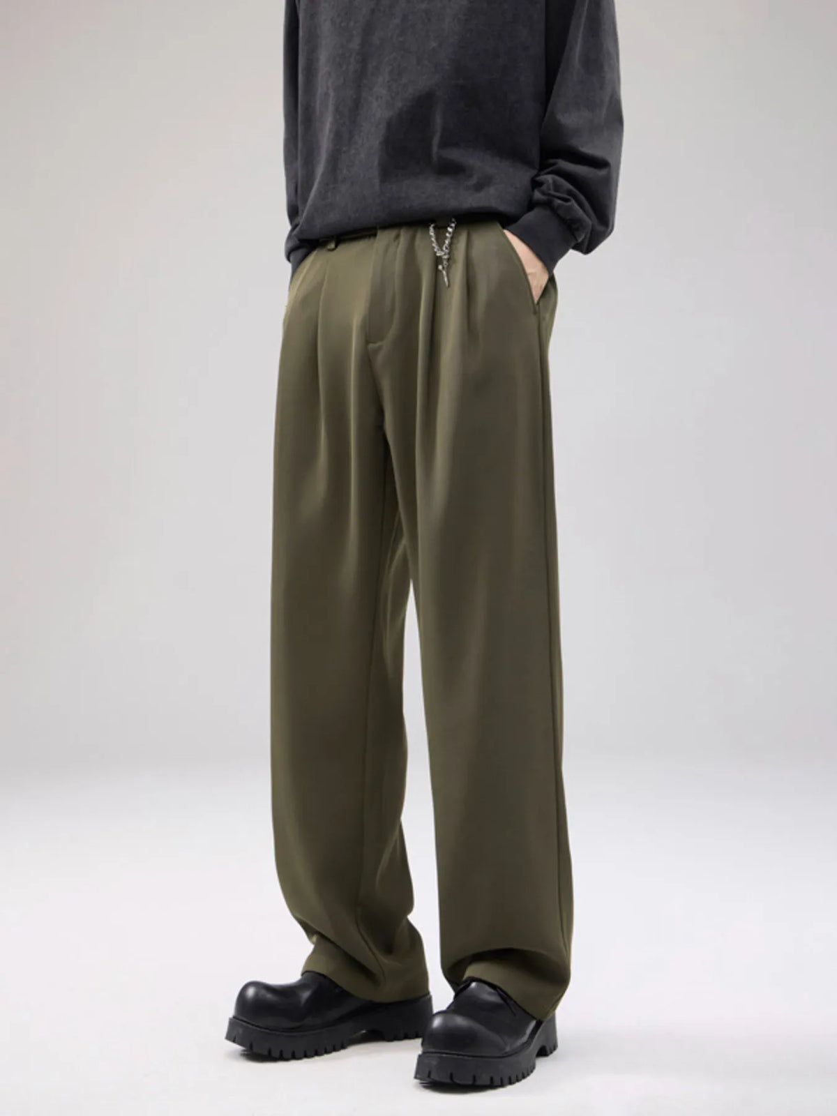 Men's wide leg pants with a drawstring waist and pockets.