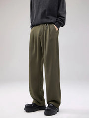 Men's wide leg pants with a drawstring waist and pockets.