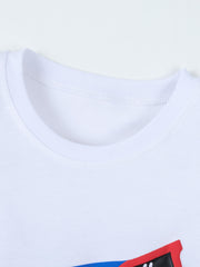 Close-up detail of the white round neckline and stitching on children's shark graphic T-shirt