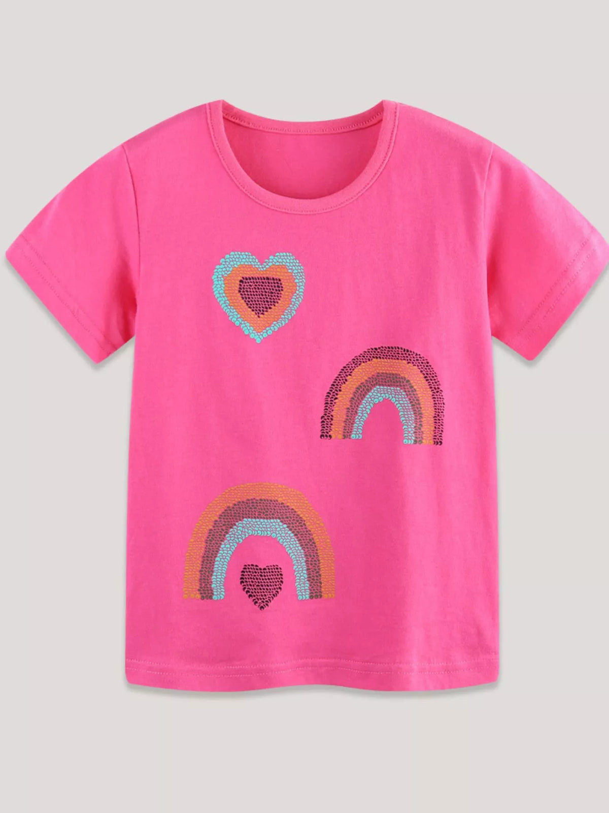 Flat front view of a hot pink children's tee with sequin hearts and rainbow motifs