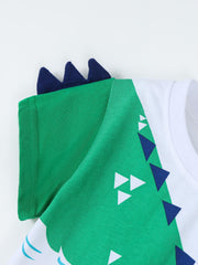 Close view of the green sleeve with navy spikes on a white children's t shirt