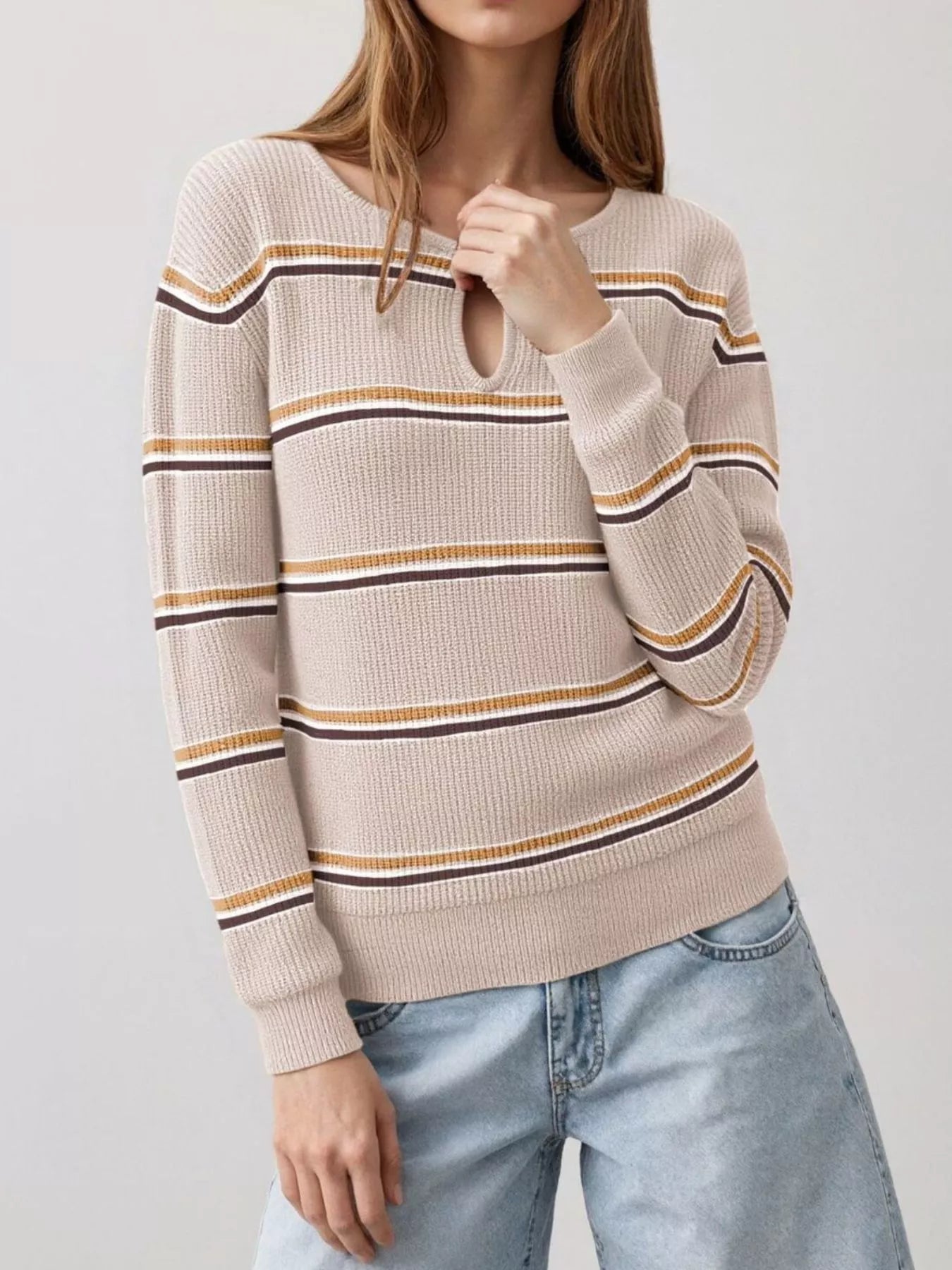 Front view of a khaki striped ribbed knit top with a keyhole neckline