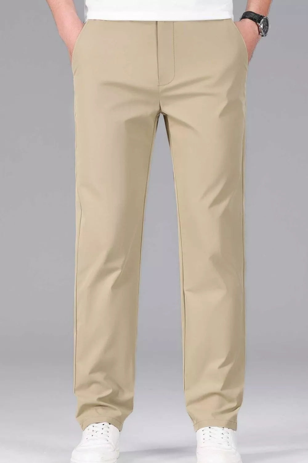 Men's khaki slim-fit stretch dress pants with pockets.