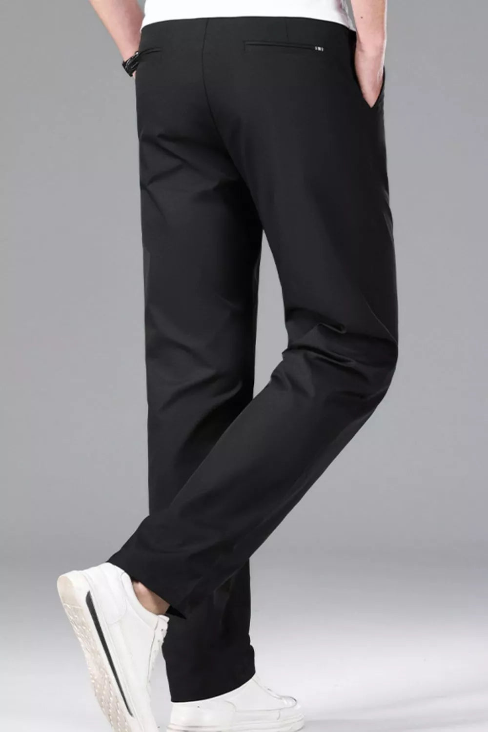 Men's slim-fit stretch dress pants with pockets.