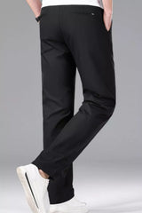 Men's slim-fit stretch dress pants with pockets.