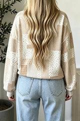 Back view of tan vintage patchwork dropped shoulder sweatshirt with floral and gingham panels