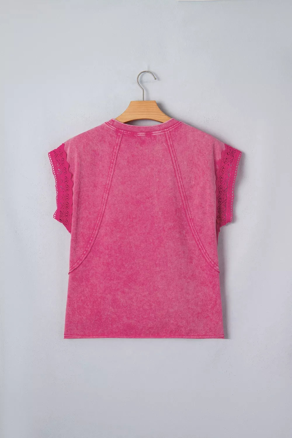 Pink mineral wash top shown from the back