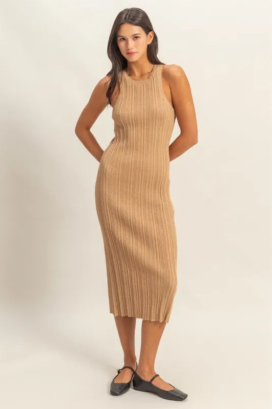 Taupe round neck bodycon ribbed knit dress worn on model, front view, hands behind back
