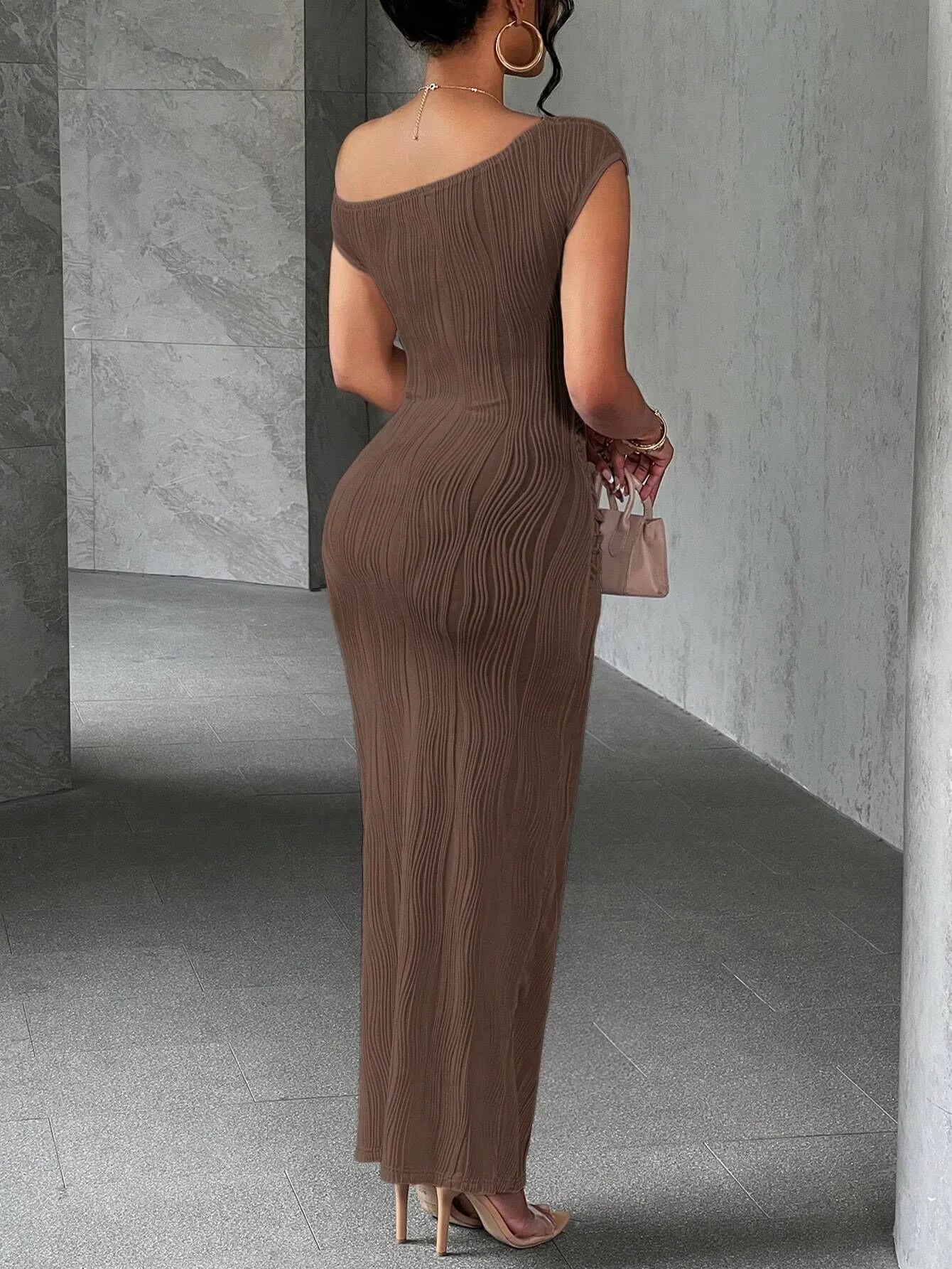 Back view of a camel asymmetrical one shoulder ribbed bodycon maxi dress