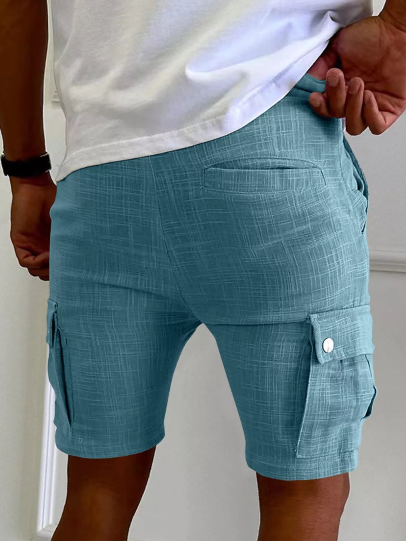 Men's casual cargo shorts with a drawstring waist and pockets.