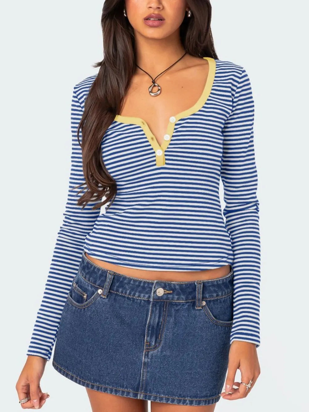 Royal blue and white striped long sleeve t shirt with pale yellow trim and white buttons front view