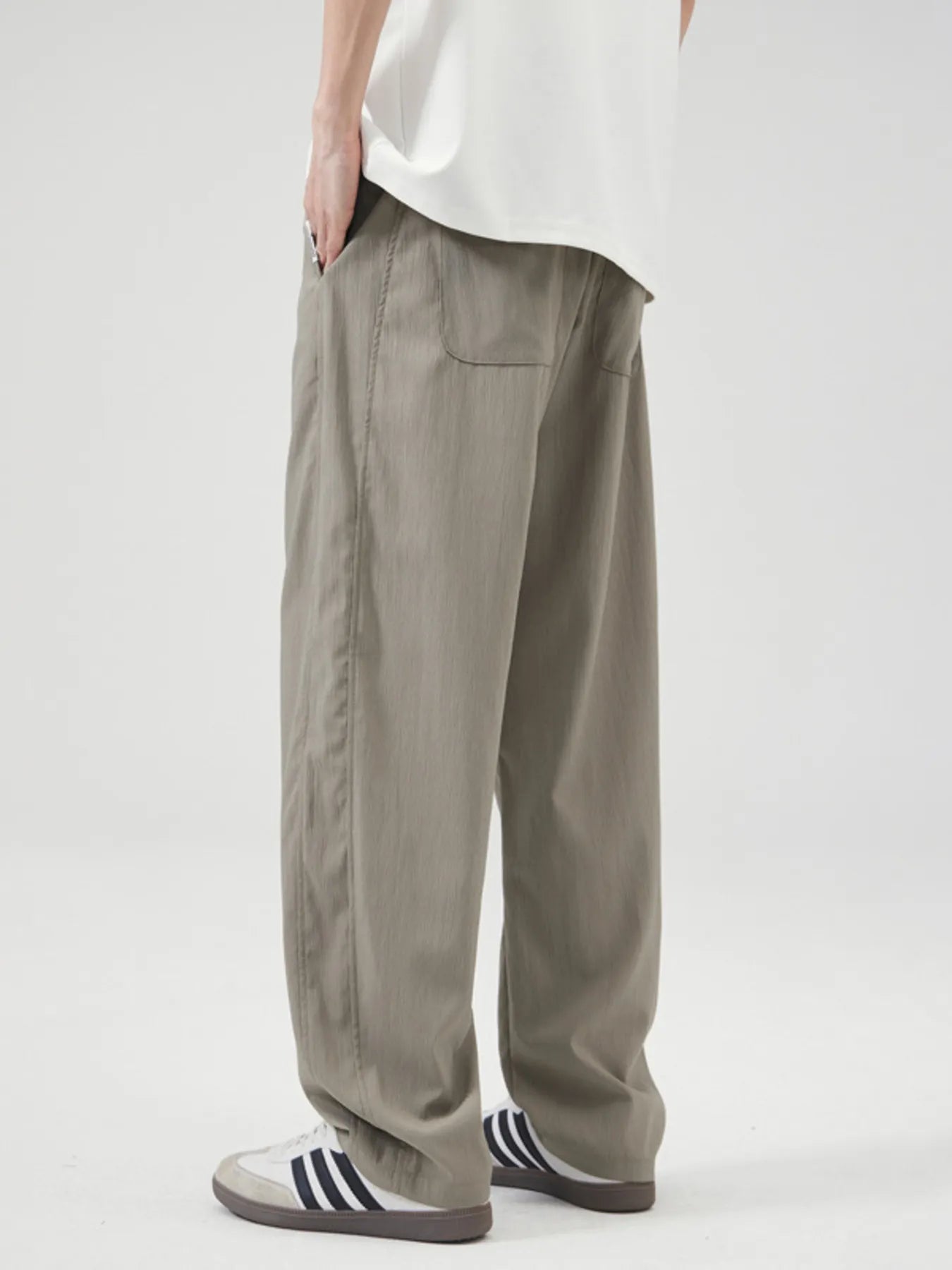 Men's casual wide leg pants with a drawstring waist.