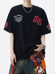 Men's varsity-style round-neck T-shirt with applique detailing in a cotton-spandex blend.