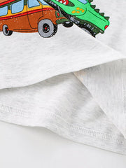 Close-up hem detail of the light gray t-shirt with folded fabric and vehicle print edge