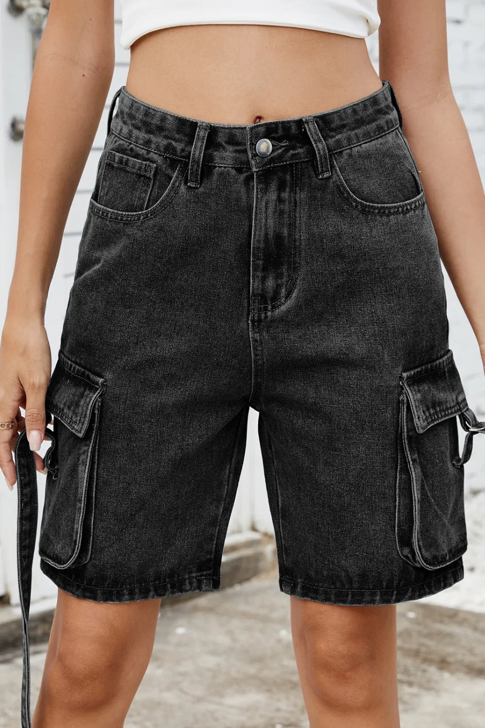 Women's washed cargo denim shorts with pockets in a non-stretch rayon blend.