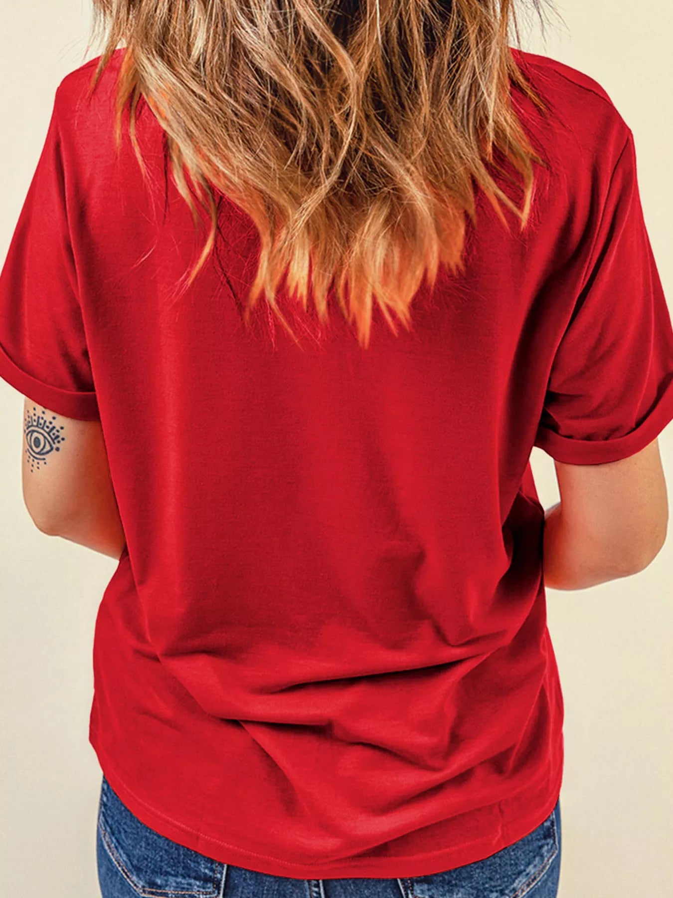 Back view of plain deep red round neck casual short sleeve top on model