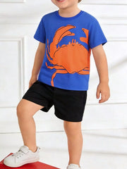 Children's royal blue crew-neck T-shirt featuring a crab graphic.