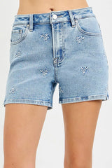 Women's high-rise denim shorts with embroidered detailing and a relaxed fit.