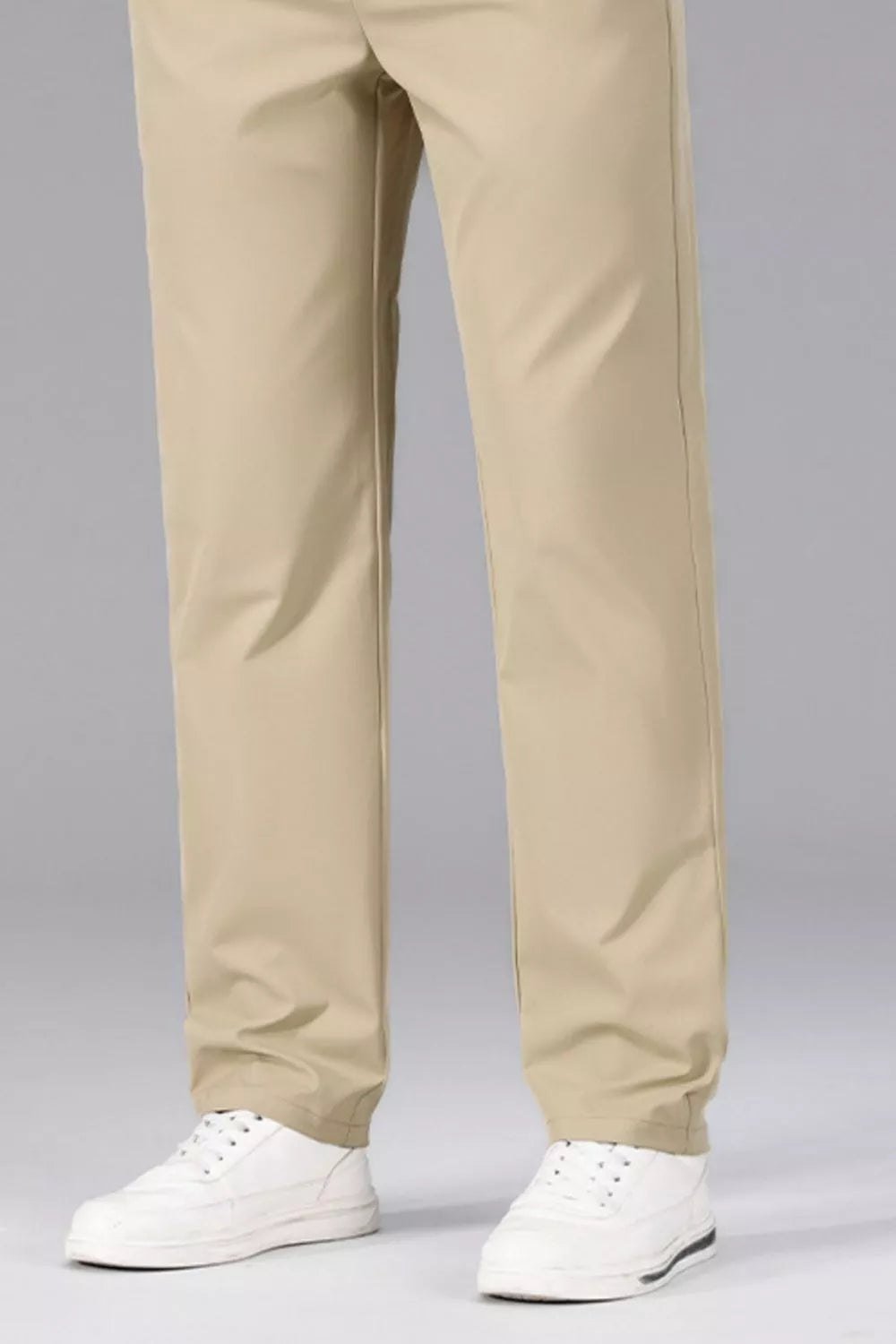 Men's slim-fit stretch dress pants with pockets.