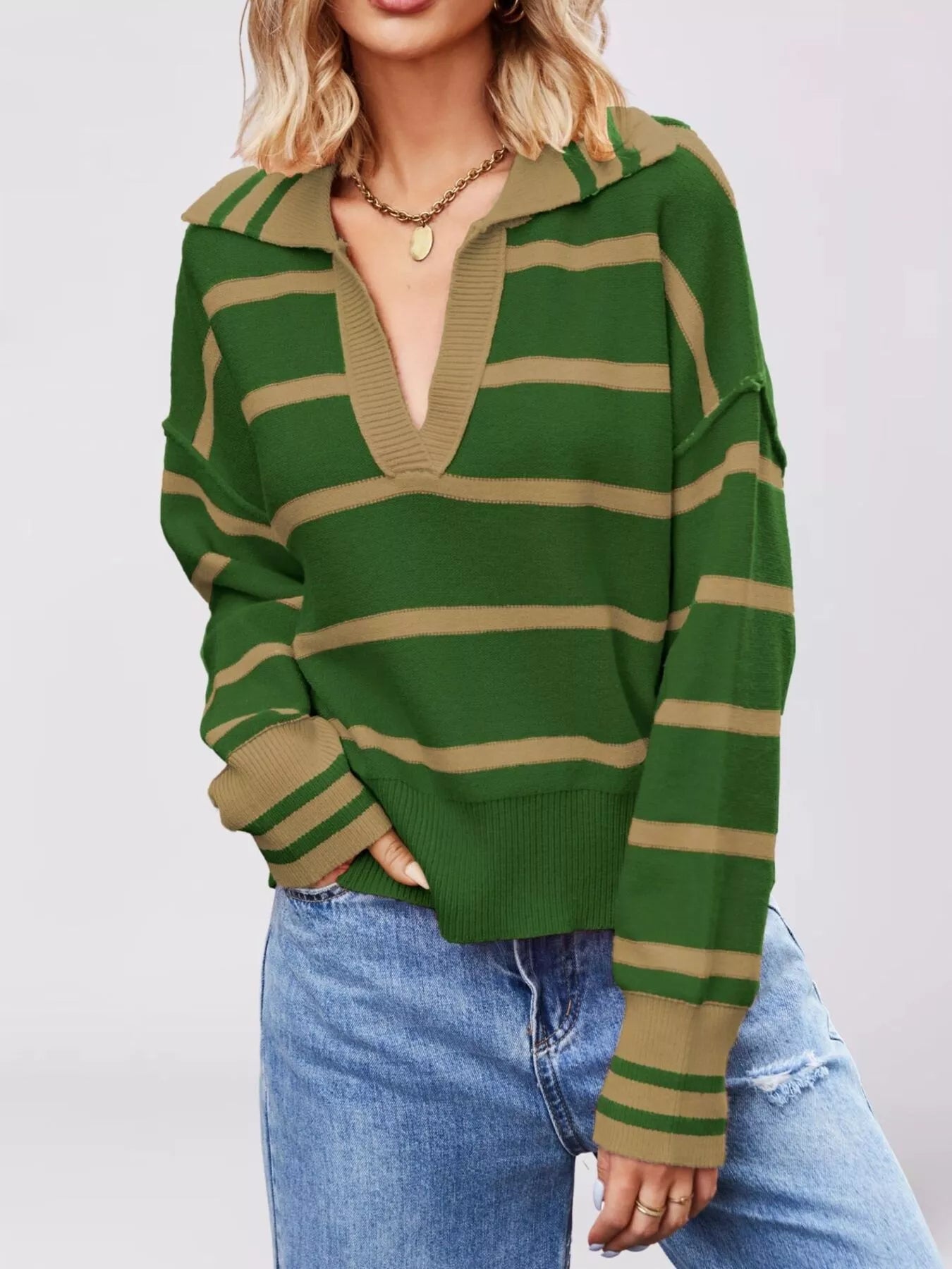 On-model front view of green striped sweater with khaki Johnny collar and dropped shoulders