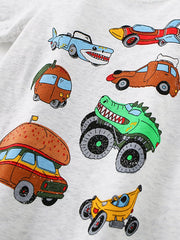 Angled close-up of the cartoon vehicle prints showing a green dinosaur monster truck and burger van