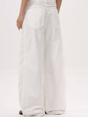 Men's wide leg casual pants with ribbed texture and pockets.
