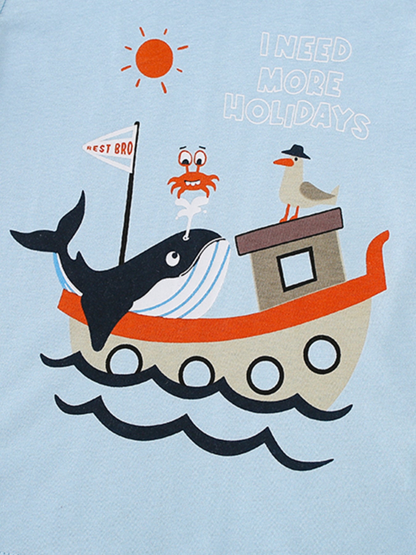 Close view of the whale boat crab and seagull graphic on the light blue children's tee