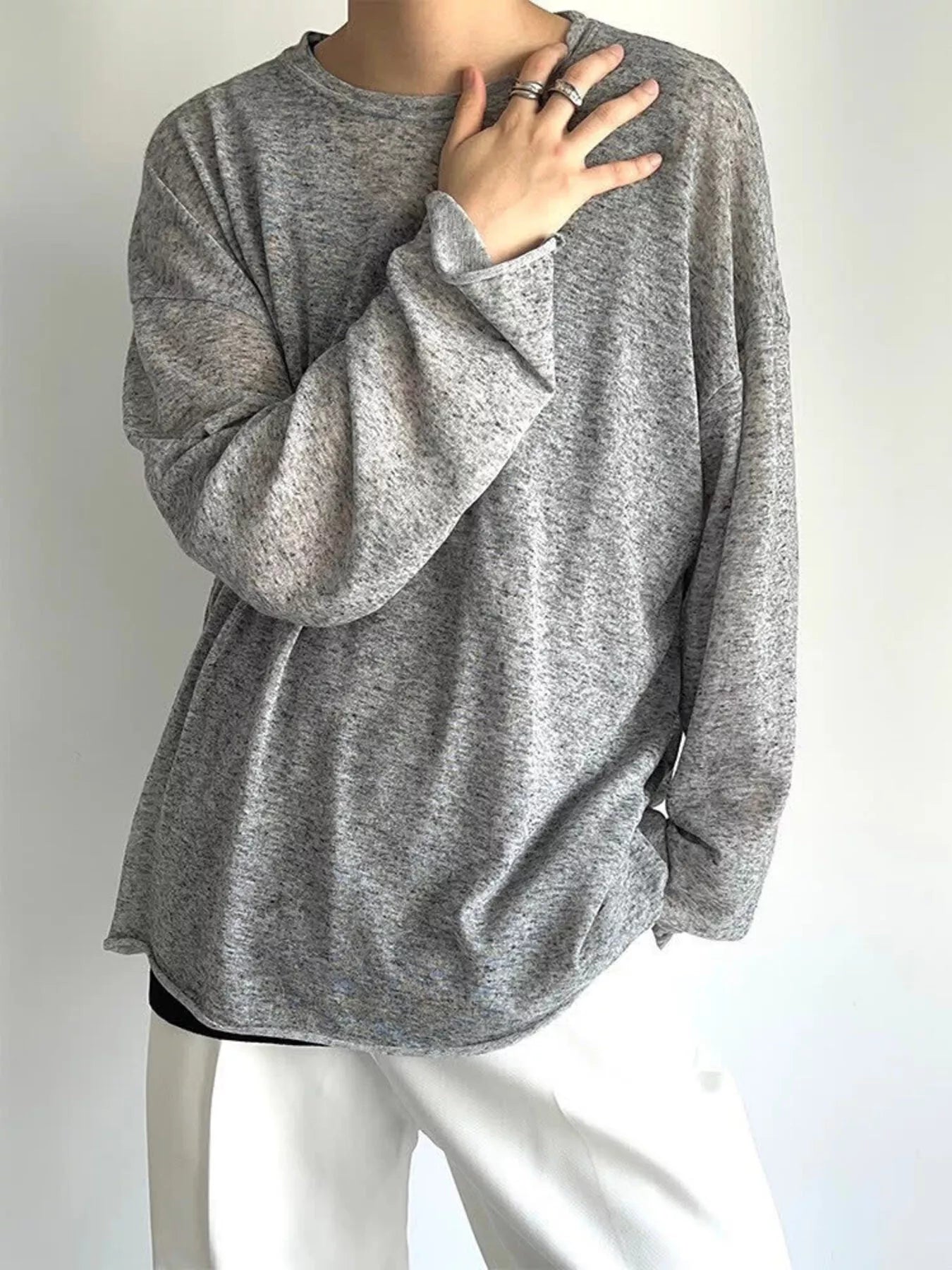 Men's heathered long-sleeve T-shirt made from a slightly stretchy cotton-spandex blend.