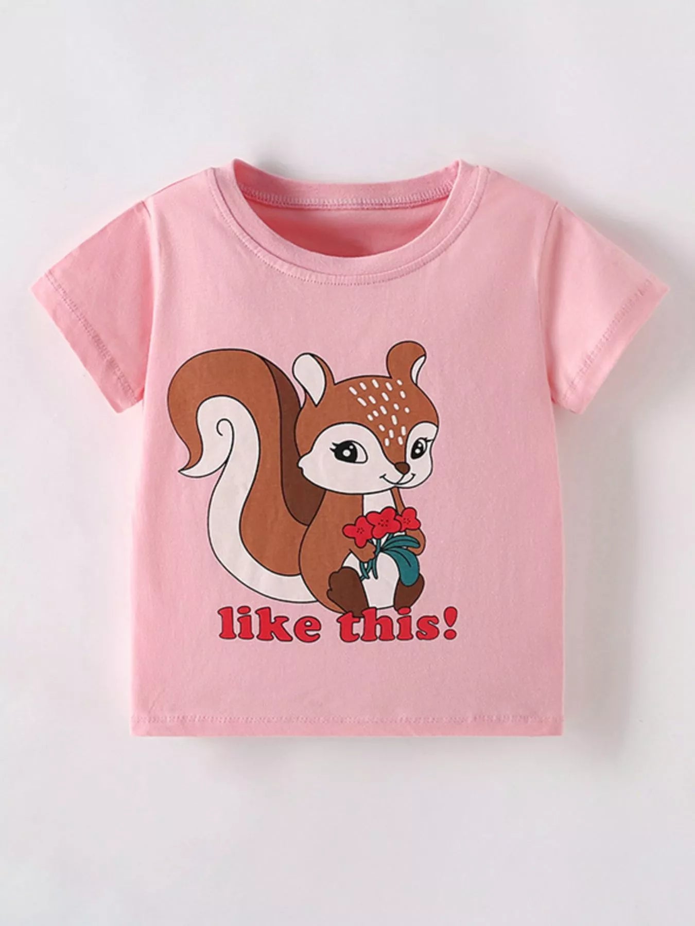 Blush pink children's short sleeve t-shirt with squirrel holding red flowers, front flat view