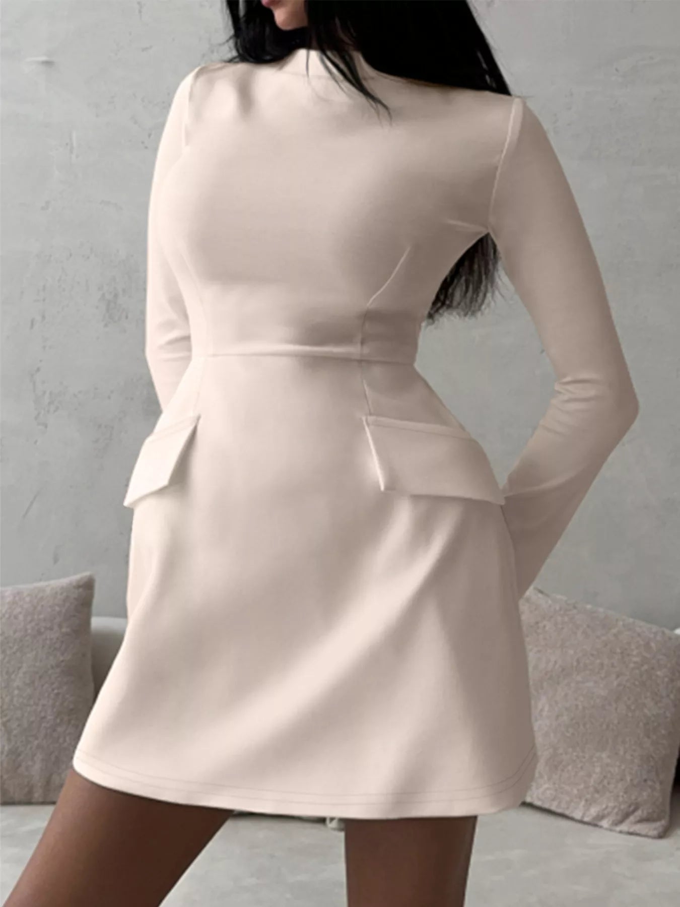 Back three quarter view of a Dust Storm mock neck long sleeve bodycon dress