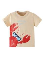 Flat lay front view of children's apricot tee with red lobster graphic and blue lettering
