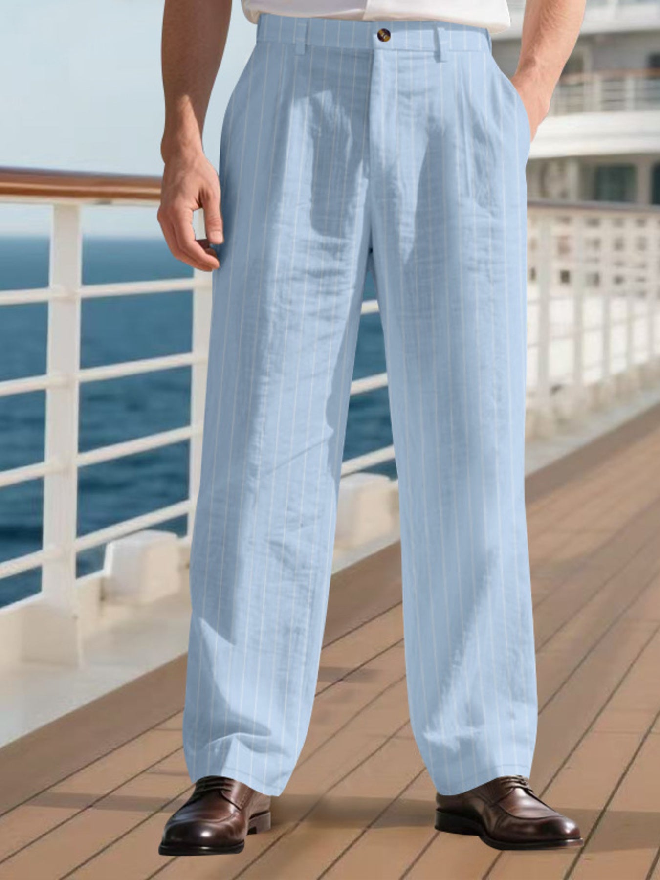 Men's light blue striped pants with wide legs and pockets.