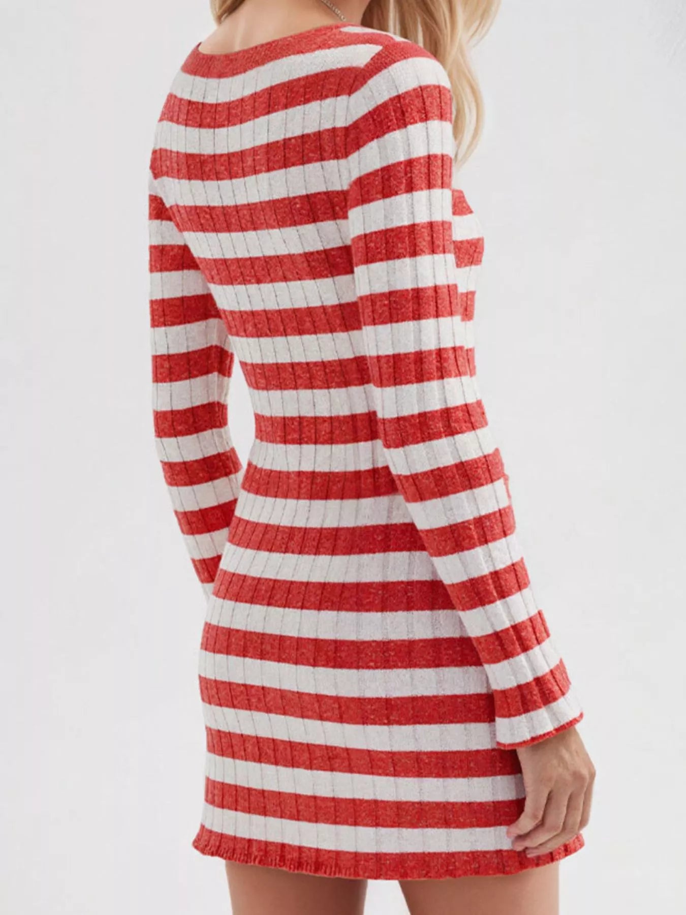 Red striped ribbed knit long sleeve sweater dress in a back view