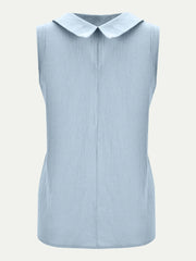 Light blue sleeveless top with a rounded Peter Pan collar, front seam, and gently curved hem