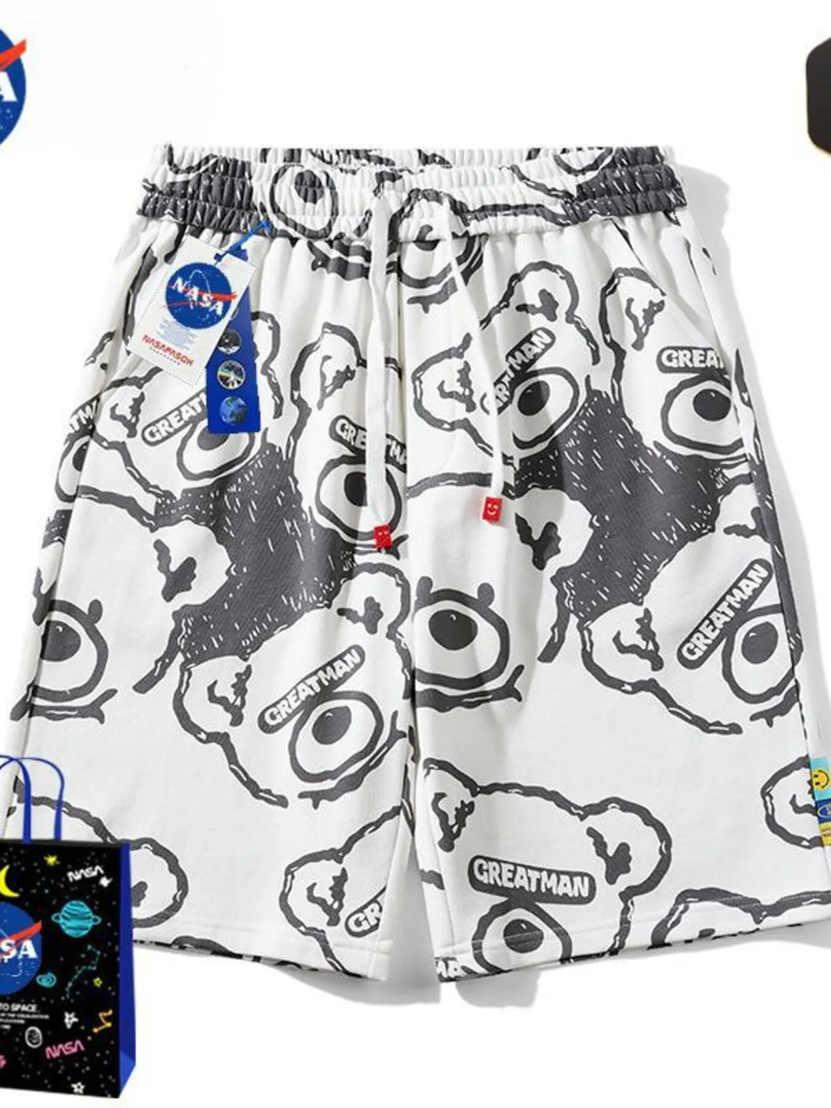 Men's white bear-print shorts with a drawstring waist and pockets.