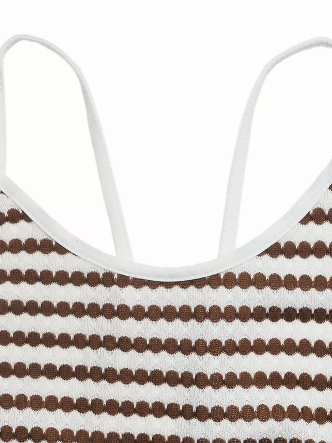 Close up of brown and white striped knit dress neckline with white straps and open back detail