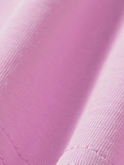 Close-up detail of the soft pink fabric texture on children's wild life T-shirt