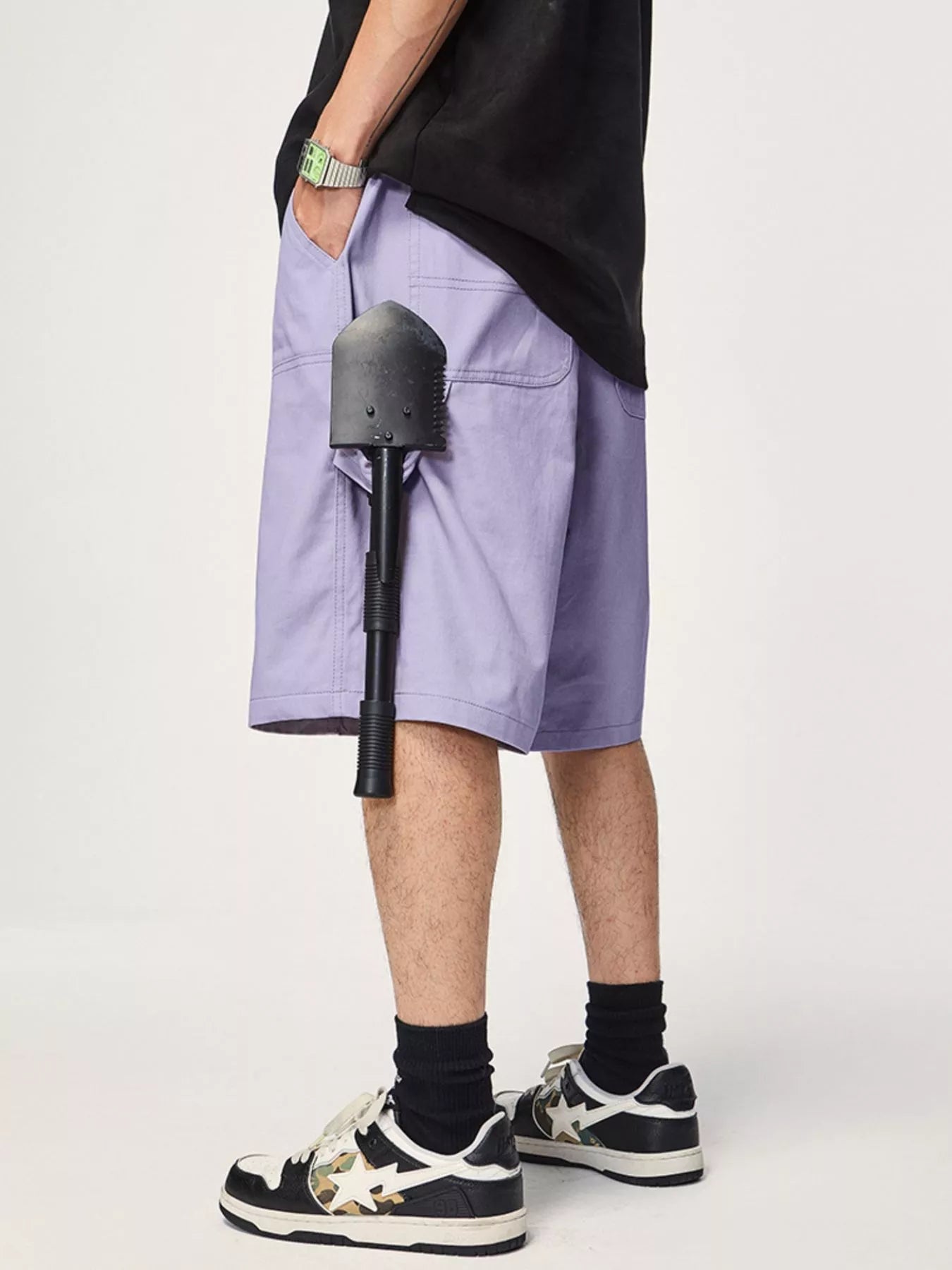 Men's casual loose fit shorts with a drawstring waist and pockets.