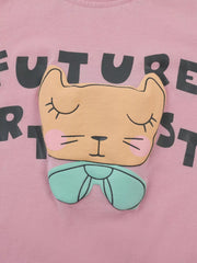 Close up of the sleeping cat face with pink cheeks and a mint bow on the pink T-shirt