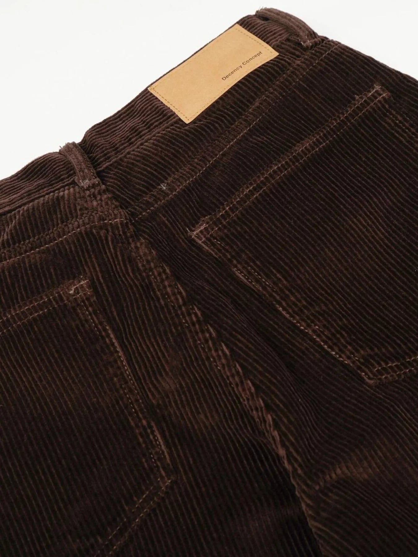 Men's corduroy pants with a wide leg silhouette.